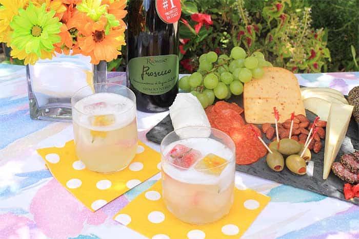 a tray of Spring Lemon & Prosecco Sorbet being served at an outdoor gathering