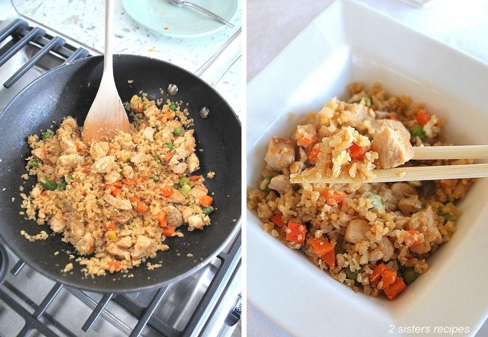 Close-up shot of cauliflower rice chicken stir-fry being cooked in a wok with steam rising