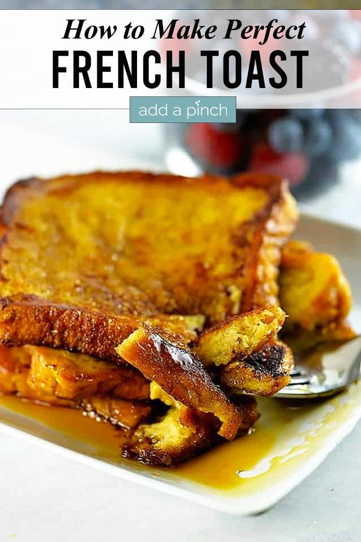 A person enjoying a plate of French toast with a happy expression