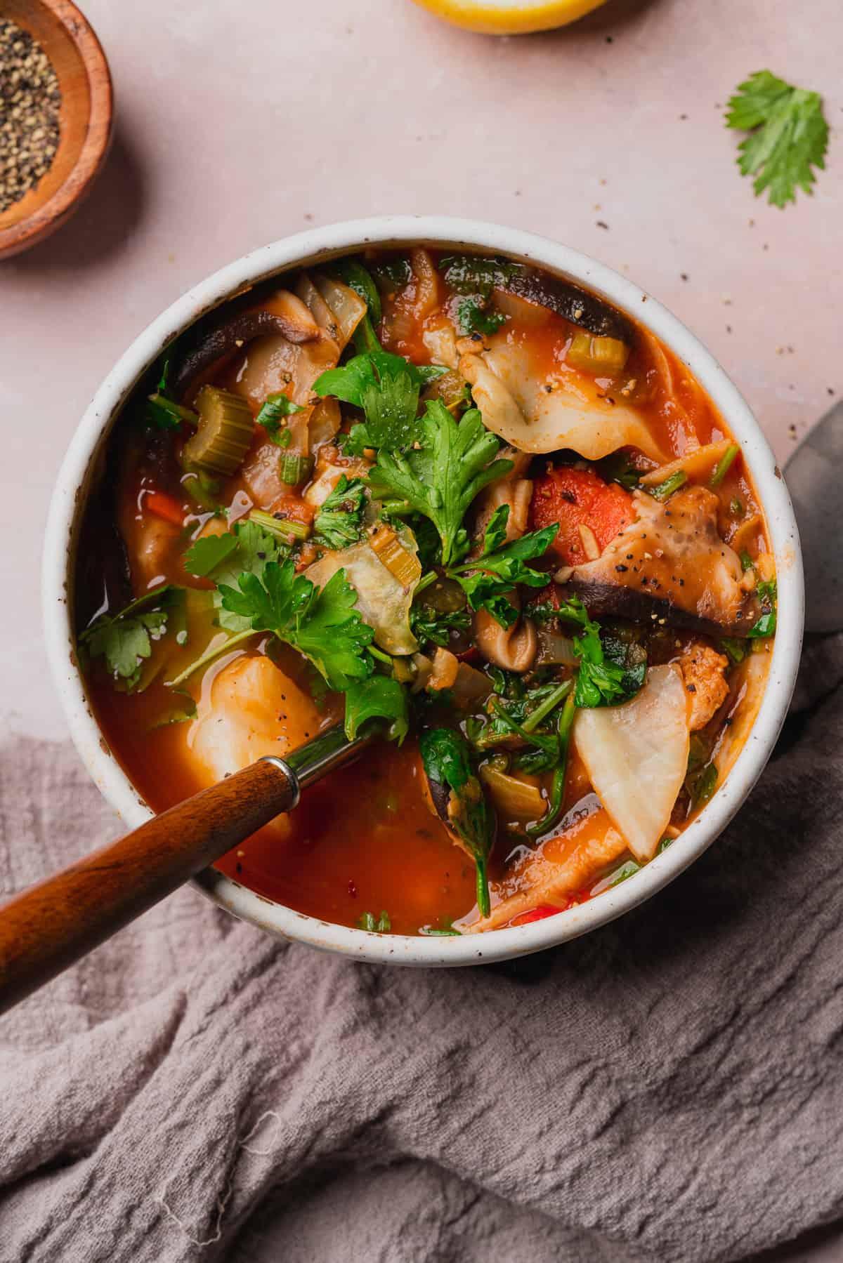A vibrant bowl of hearty keto vegetarian soup with various colorful vegetables
