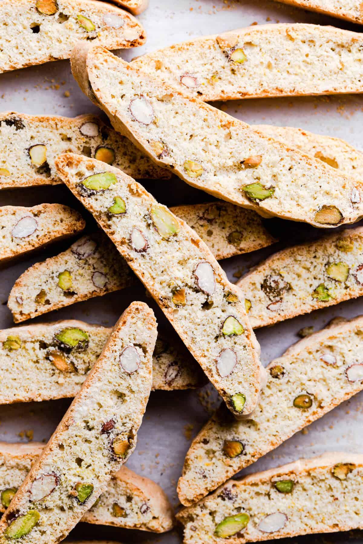 Close-up shot of a single plantain and pistachio biscotti