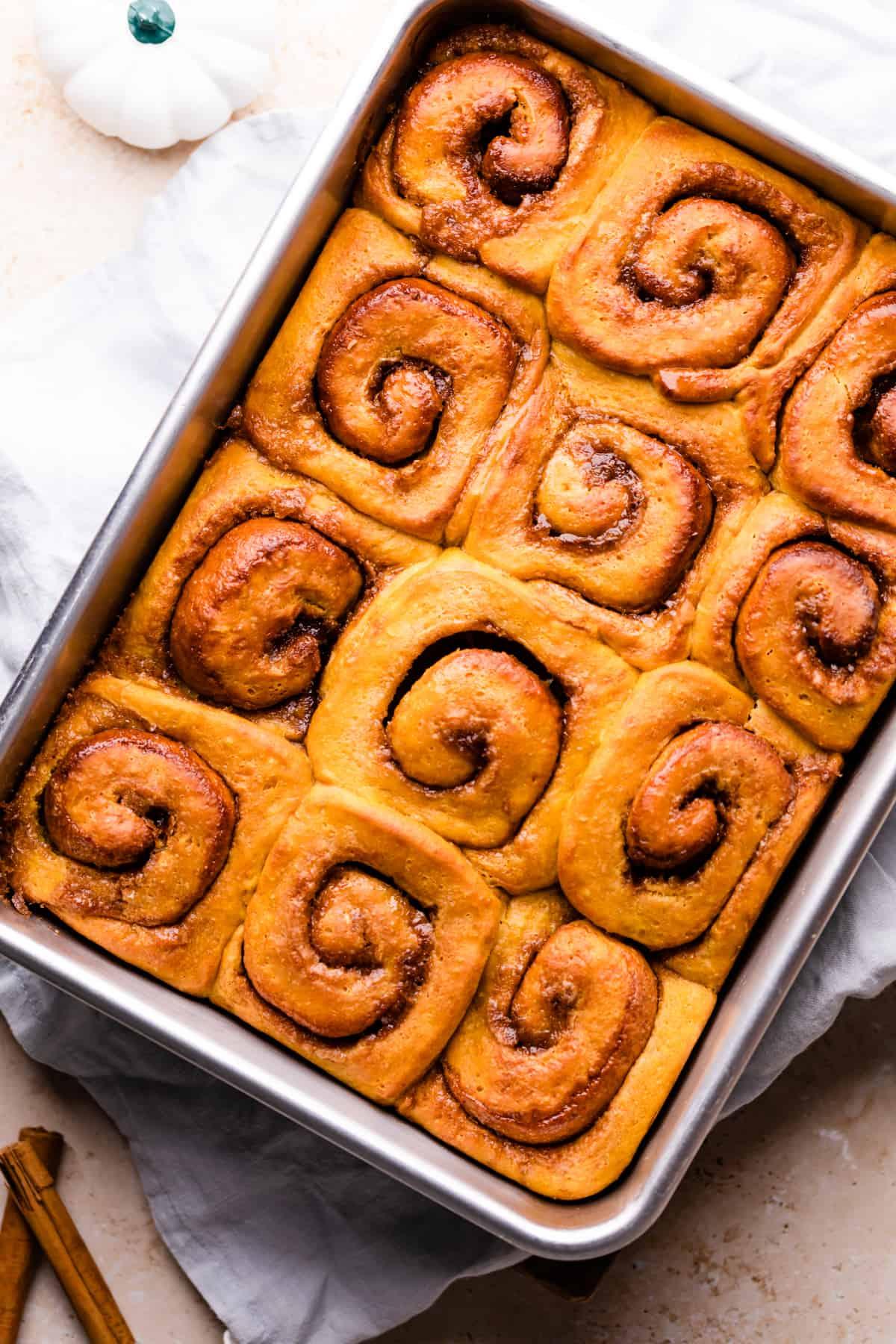 close-up shot of a single cinnamon swirl pumpkin square showing the layers