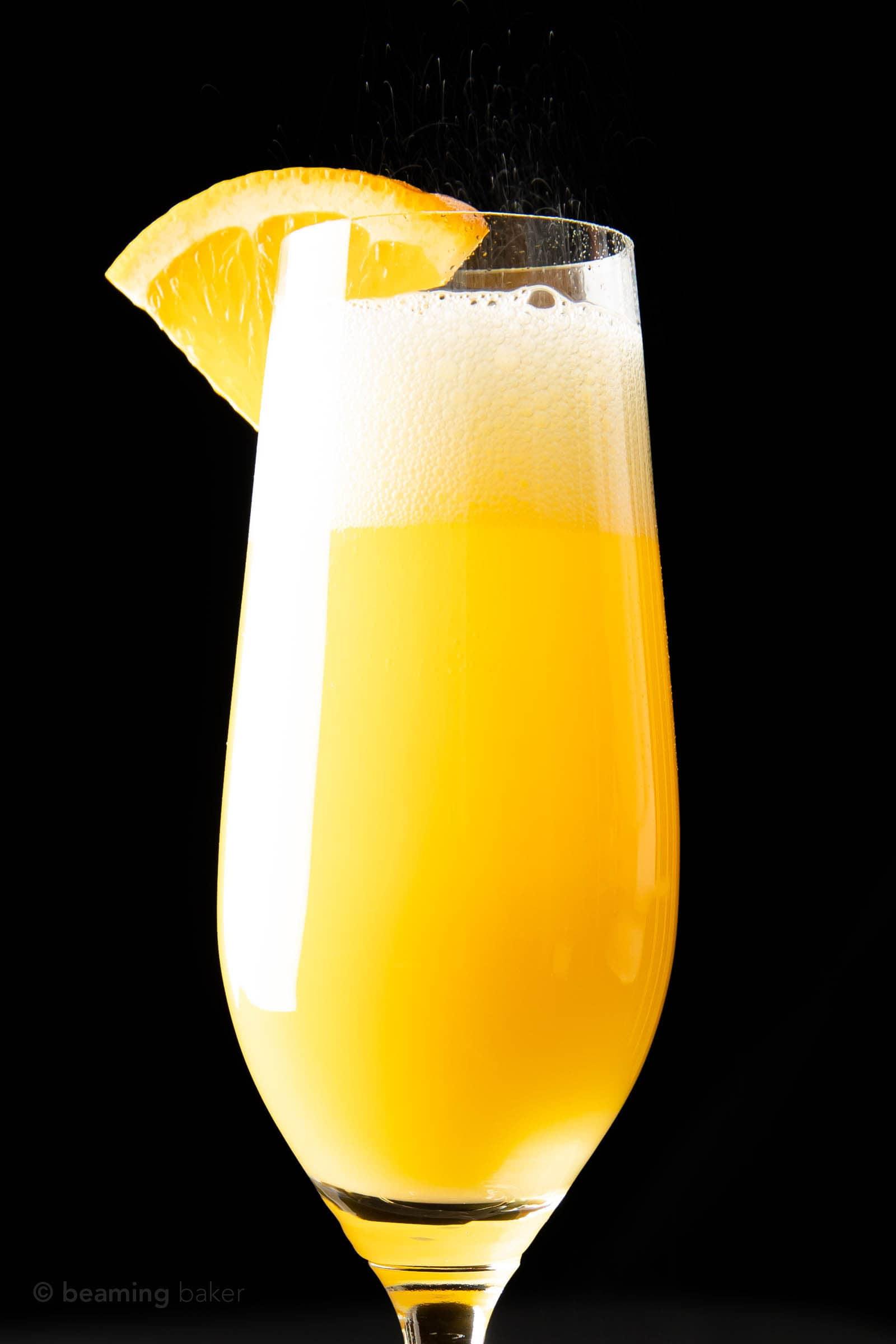 Close-up of a single mimosa in a champagne flute