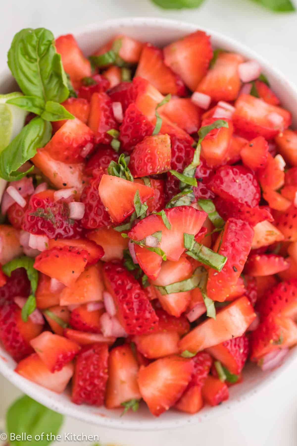 Close-up of the finished strawberry salsa in a bowl