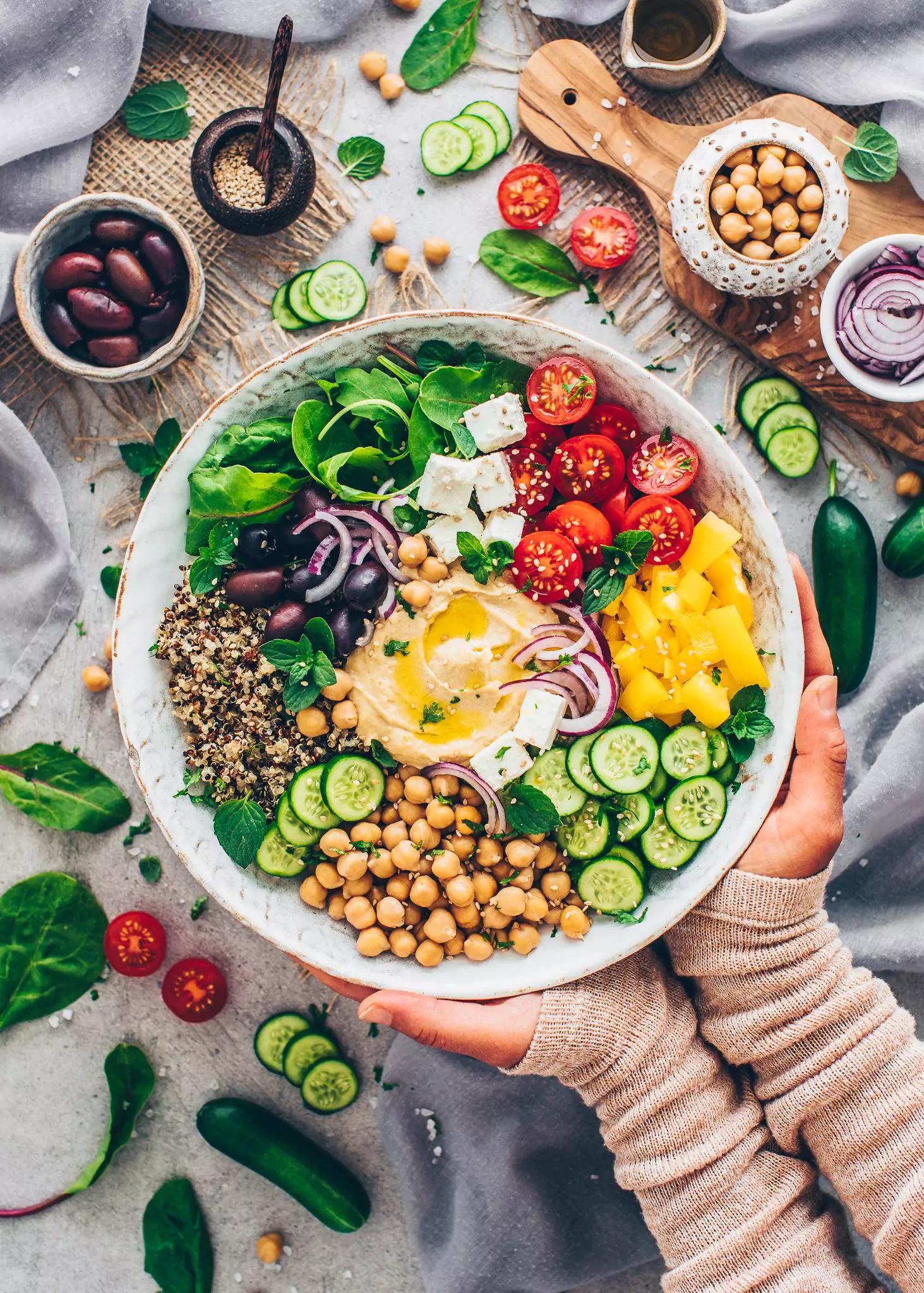Close-up of a colorful Buddha bowl with quinoa, edamame, and vegetables