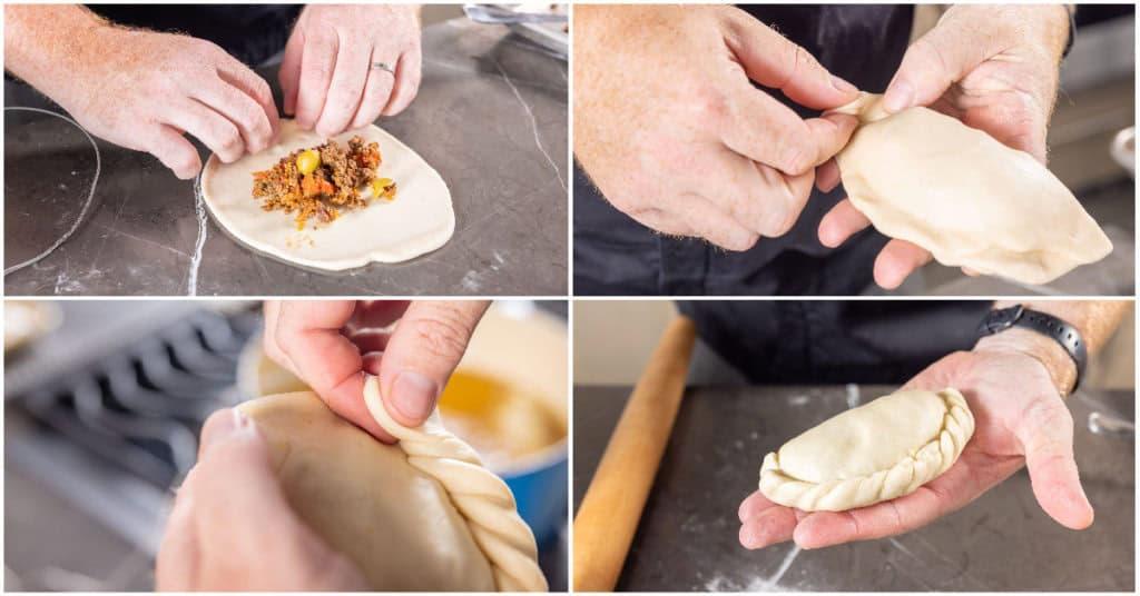 Close up of hands crimping the edges of an empanada