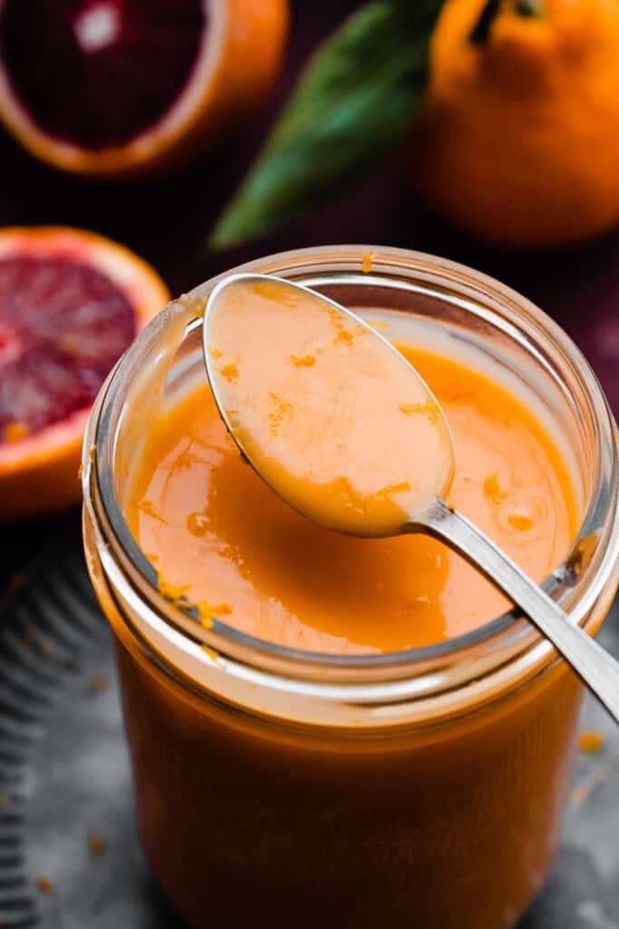 Close up of the orange curd in a small bowl