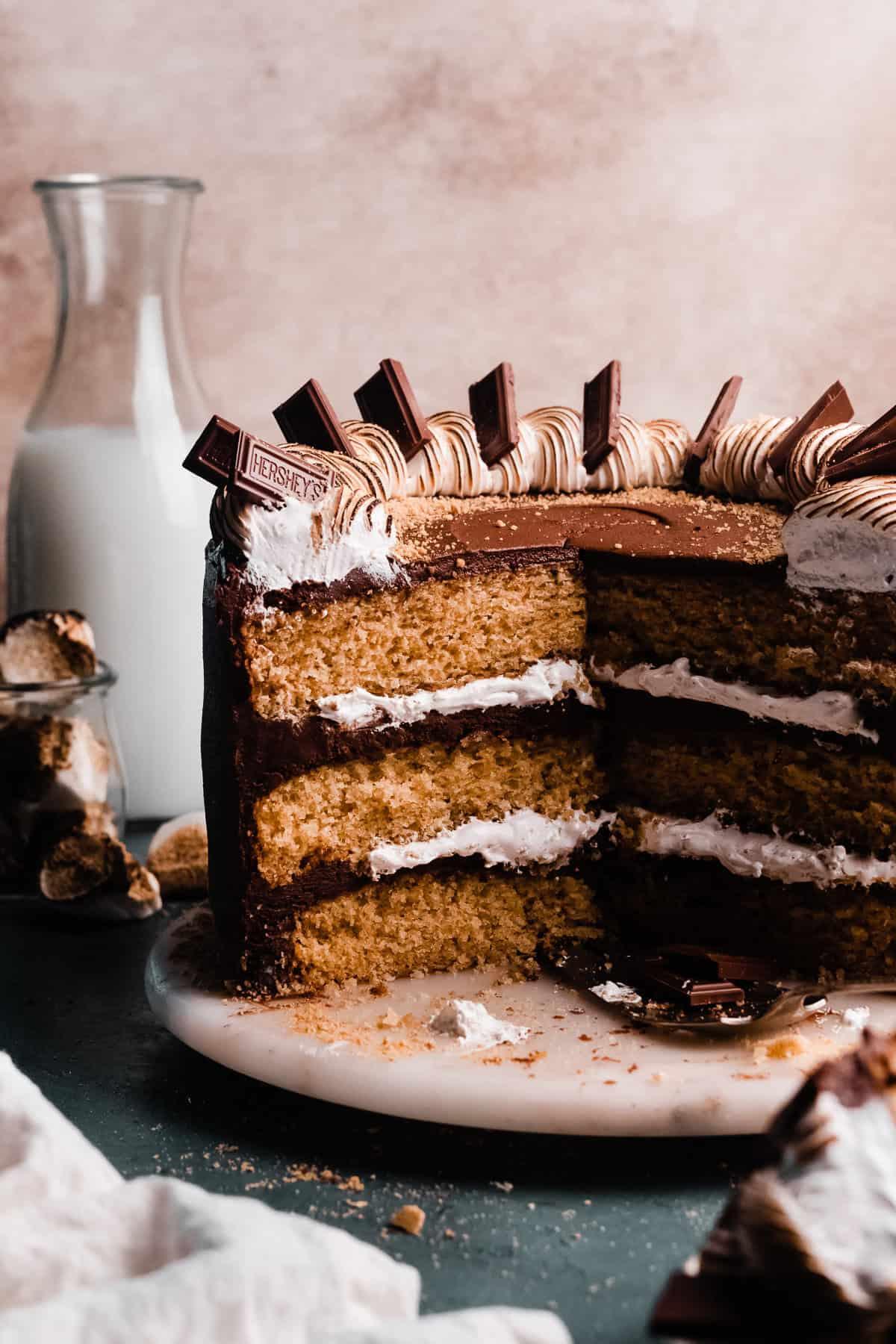 Close up of a slice of s'mores cake showing the texture and layers
