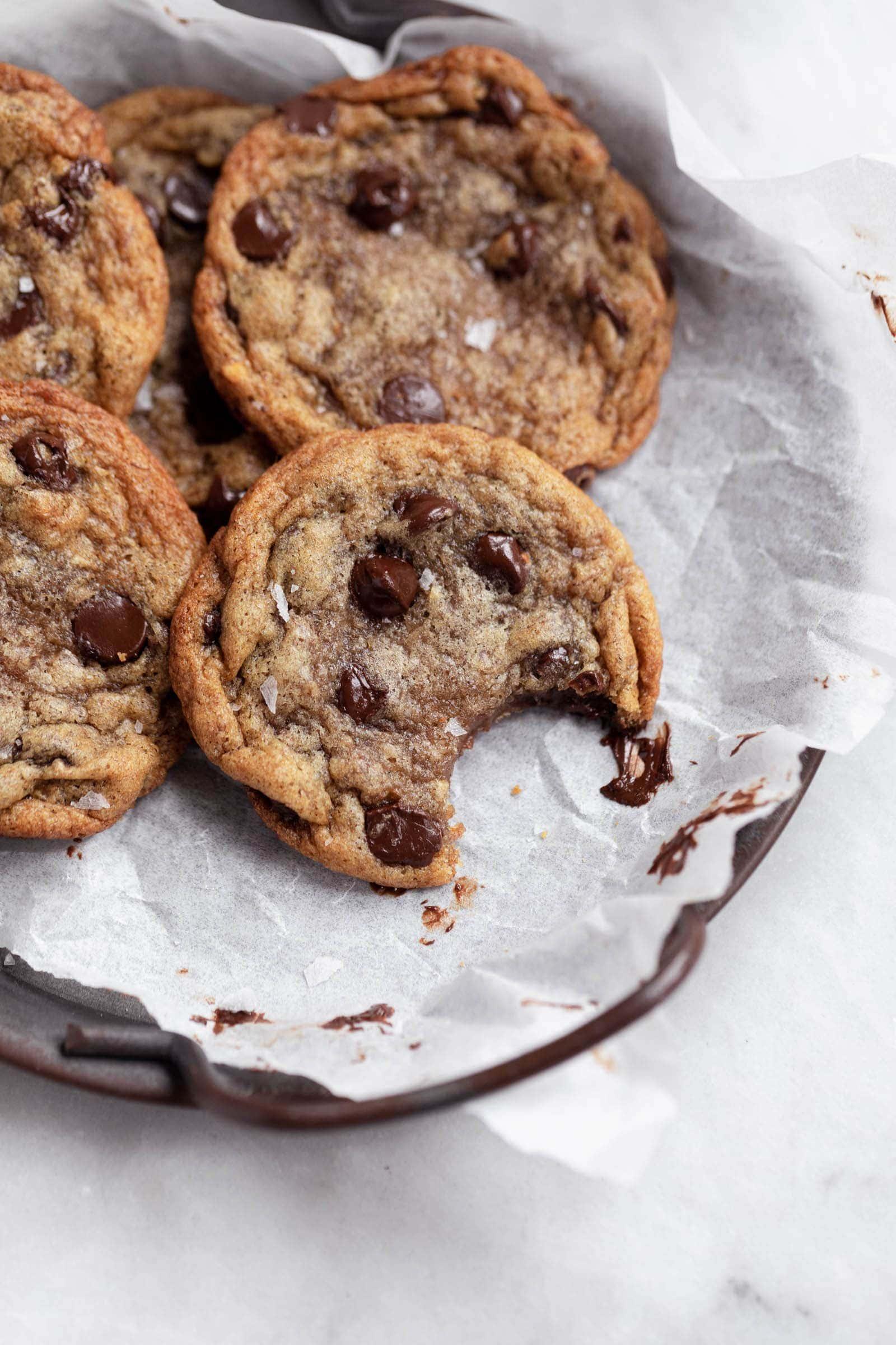 close-up of a perfectly baked banana bread chocolate chip cookie, showing the texture and chocolate chips
