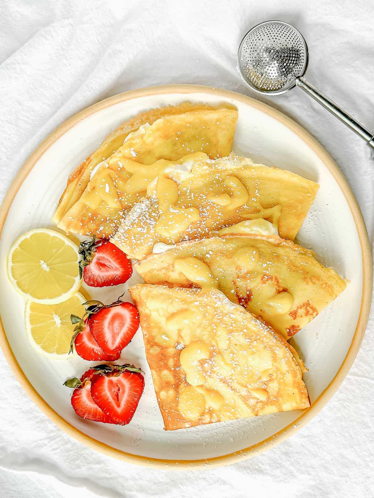 A close-up shot of a single kimchi crepe with lemon curd