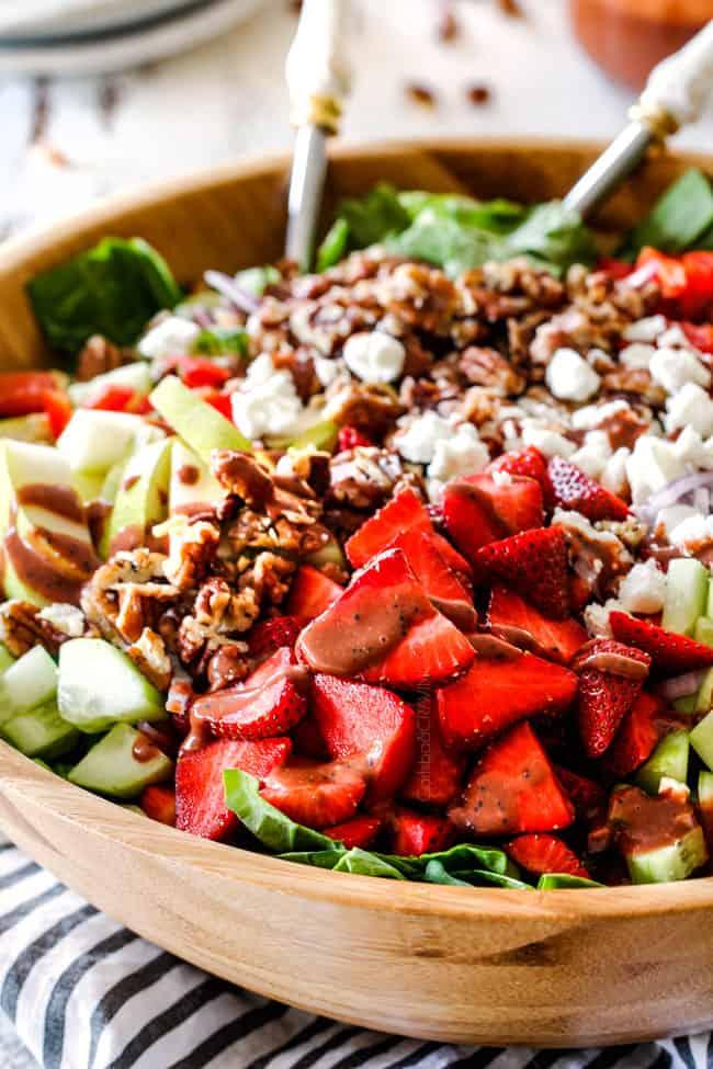A wide shot of the Strawberry Enchantment Salad, served in individual glasses or bowls, beautifully presented.
