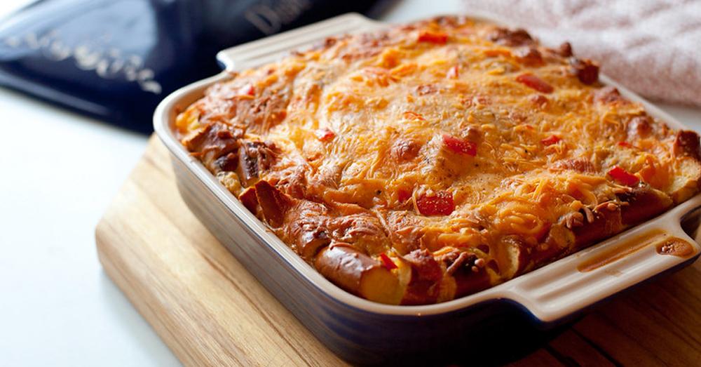 A delicious beer pretzel breakfast casserole in a baking dish, ready to be served