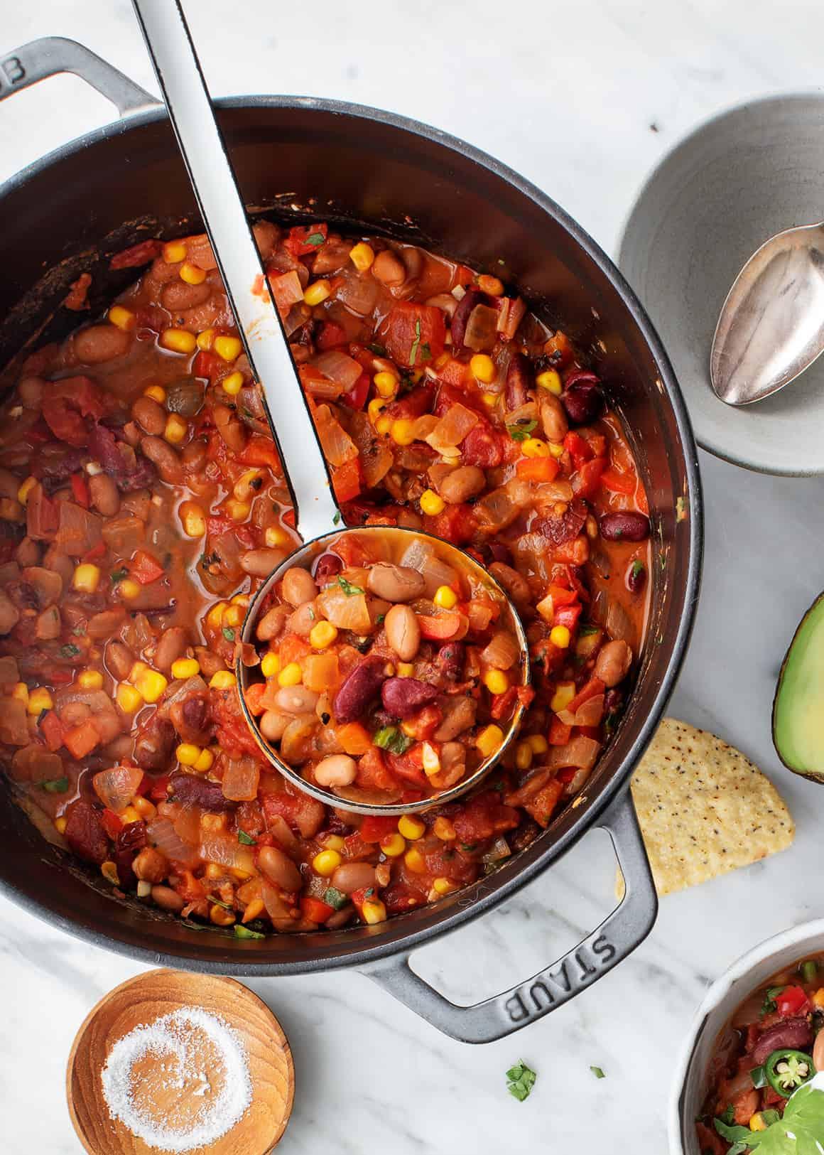 A hearty bowl of vegetarian chili with all the fixings
