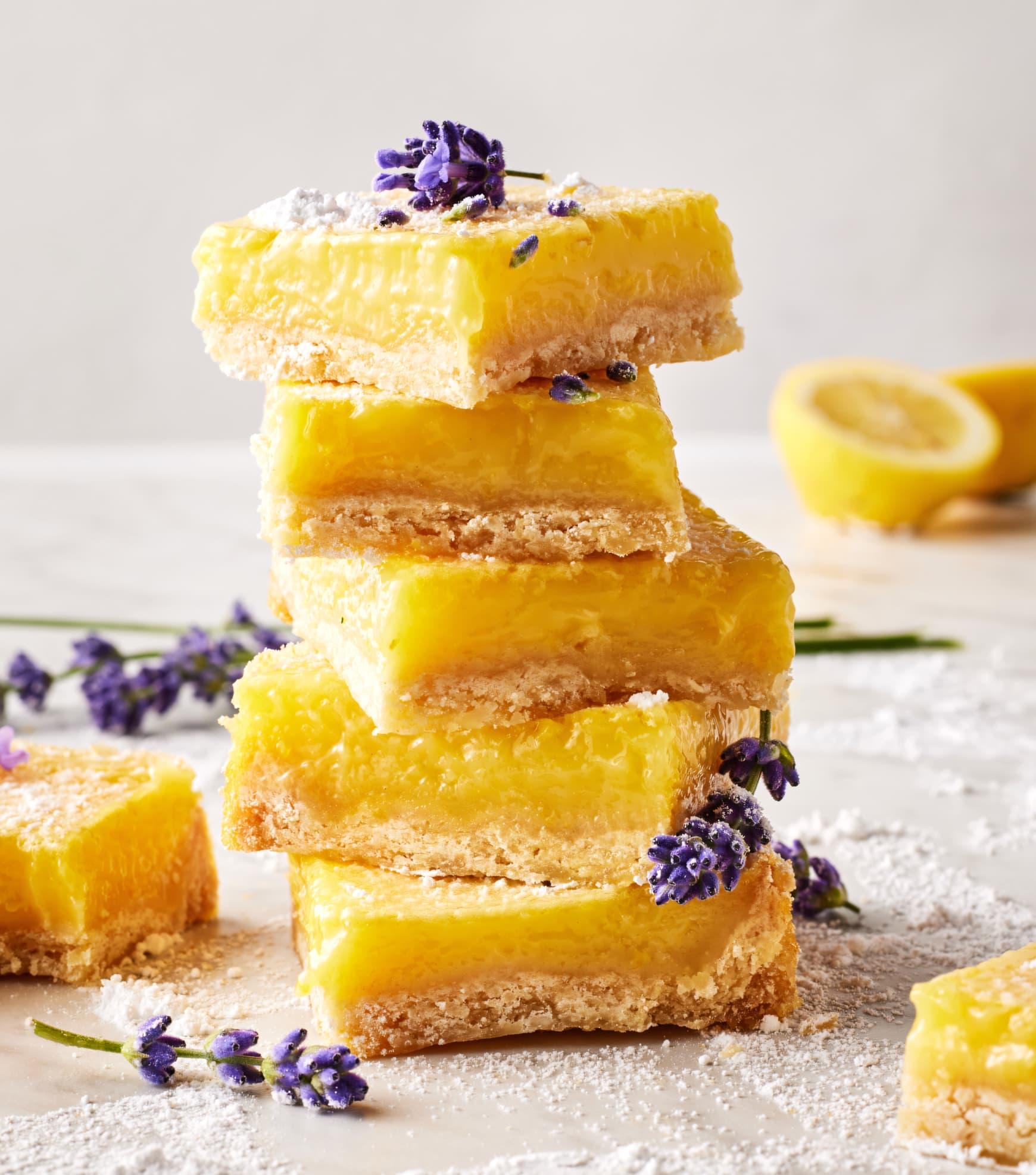 ingredients for lemon bars arranged on a kitchen counter, emphasizing fresh lemons