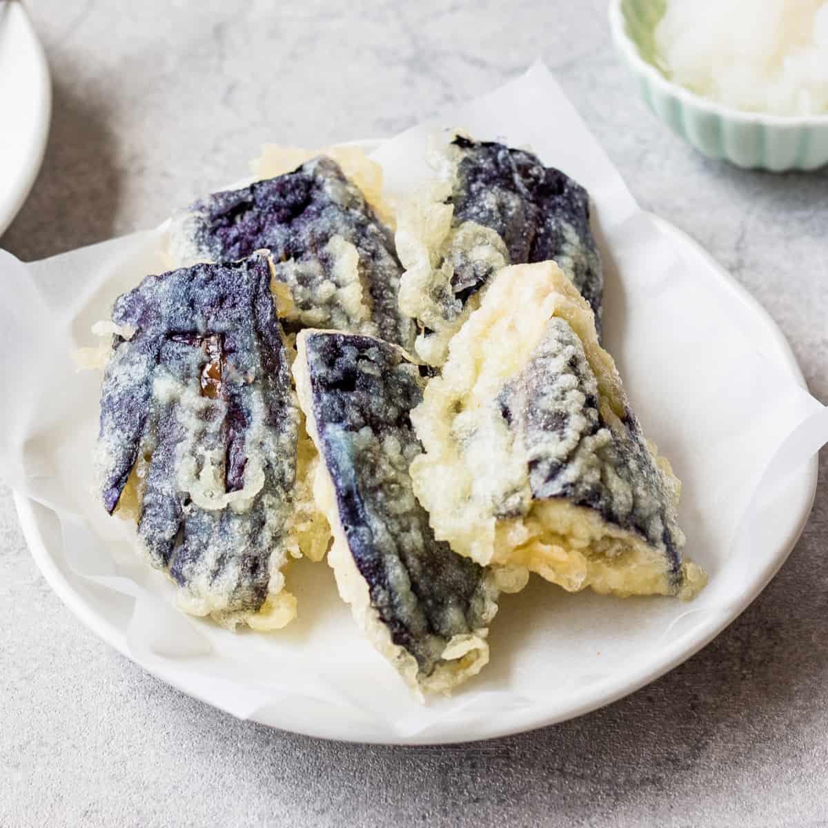 Japanese chef preparing eggplant tempura