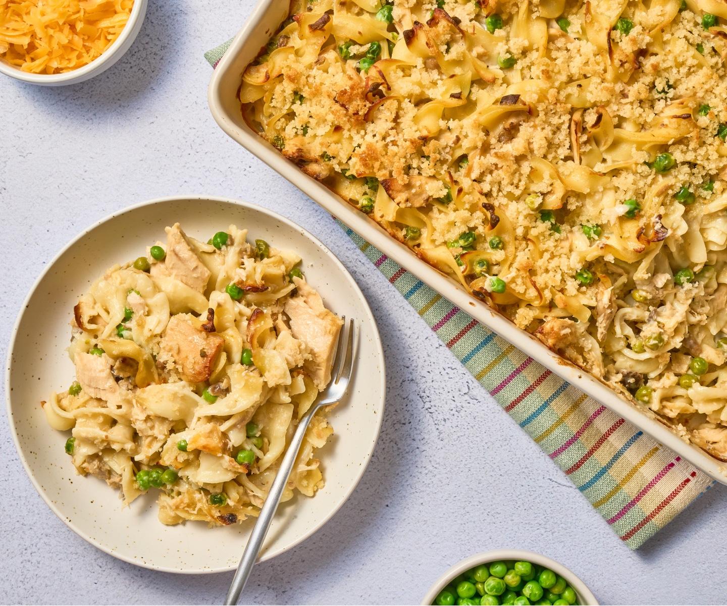 Close up shot of creamy tuna noodle casserole with golden brown breadcrumbs