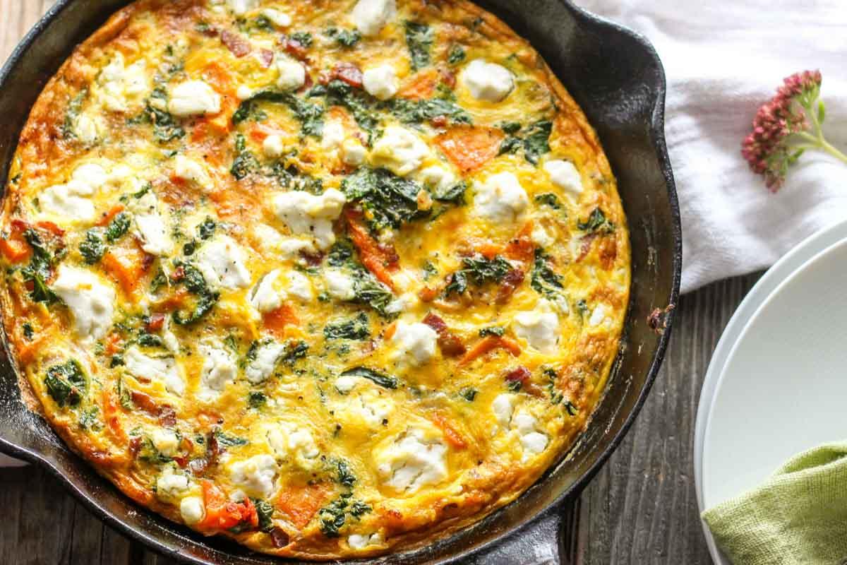 Bacon frittata on a rustic wooden table
