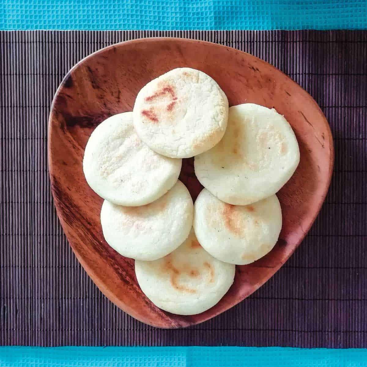 Close up of the finished arepas, showcasing textures and colors