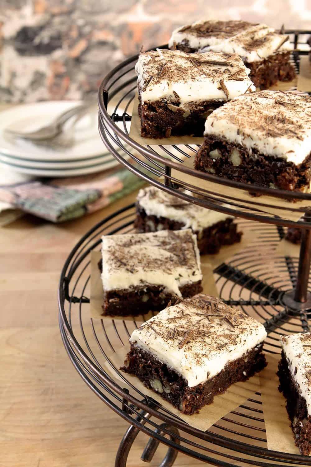 A plate of cream cheese brownies cookies, garnished with chocolate shavings