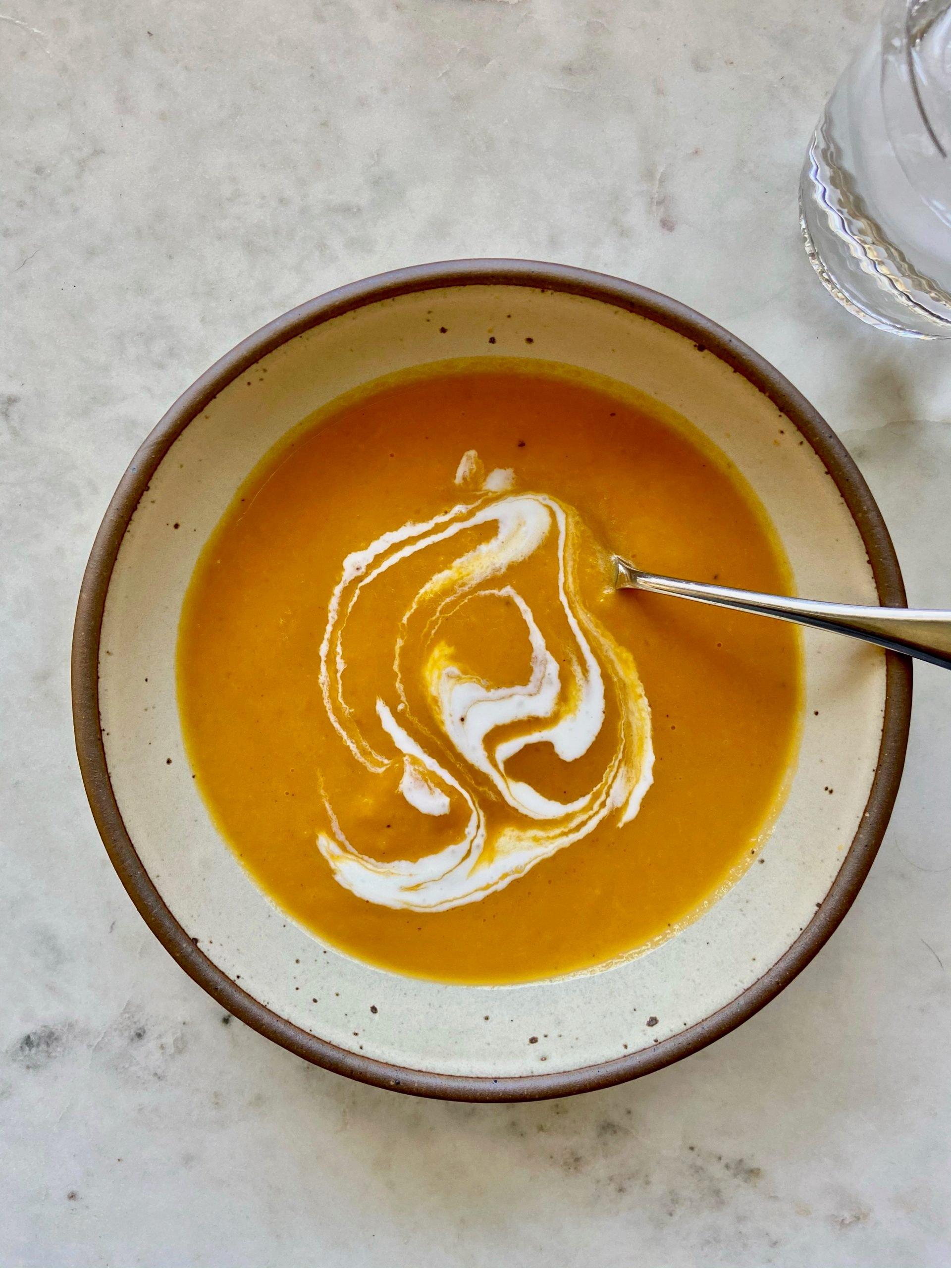 A group of friends enjoying butternut squash and apple soup together