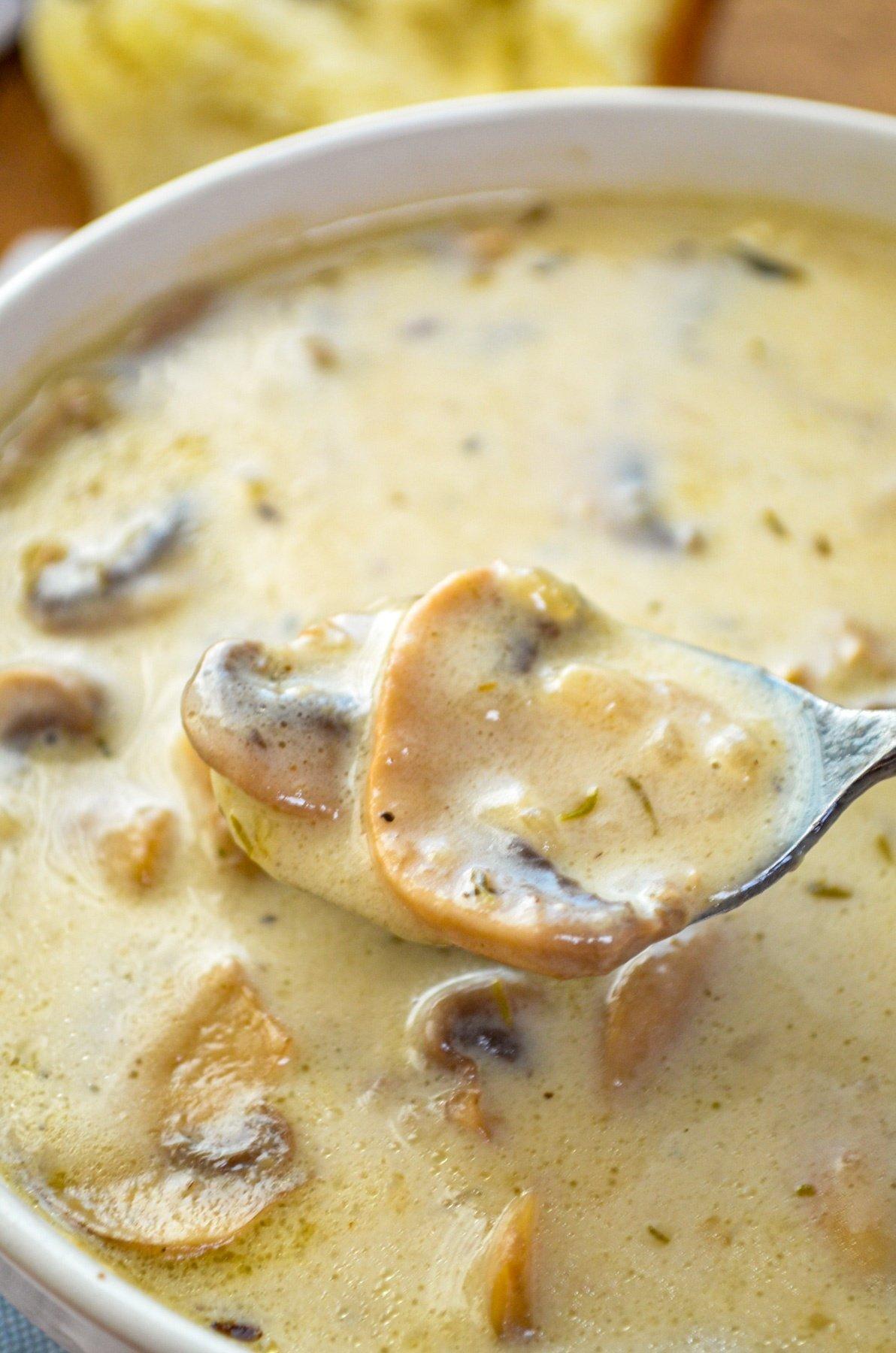 An Instant Pot with creamy mushroom soup cooking inside