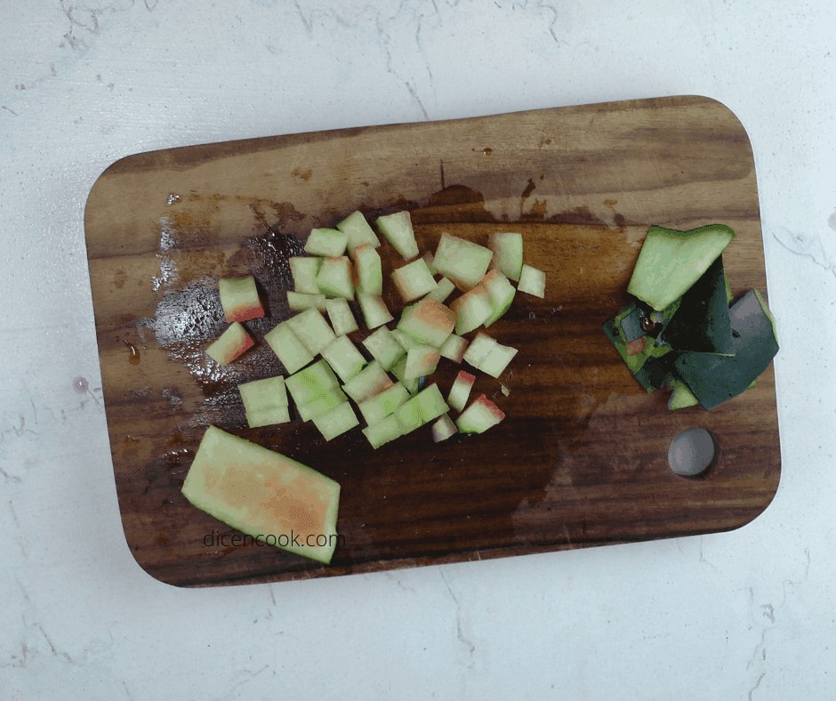 aerial view of watermelon rind crisps on a wooden board
