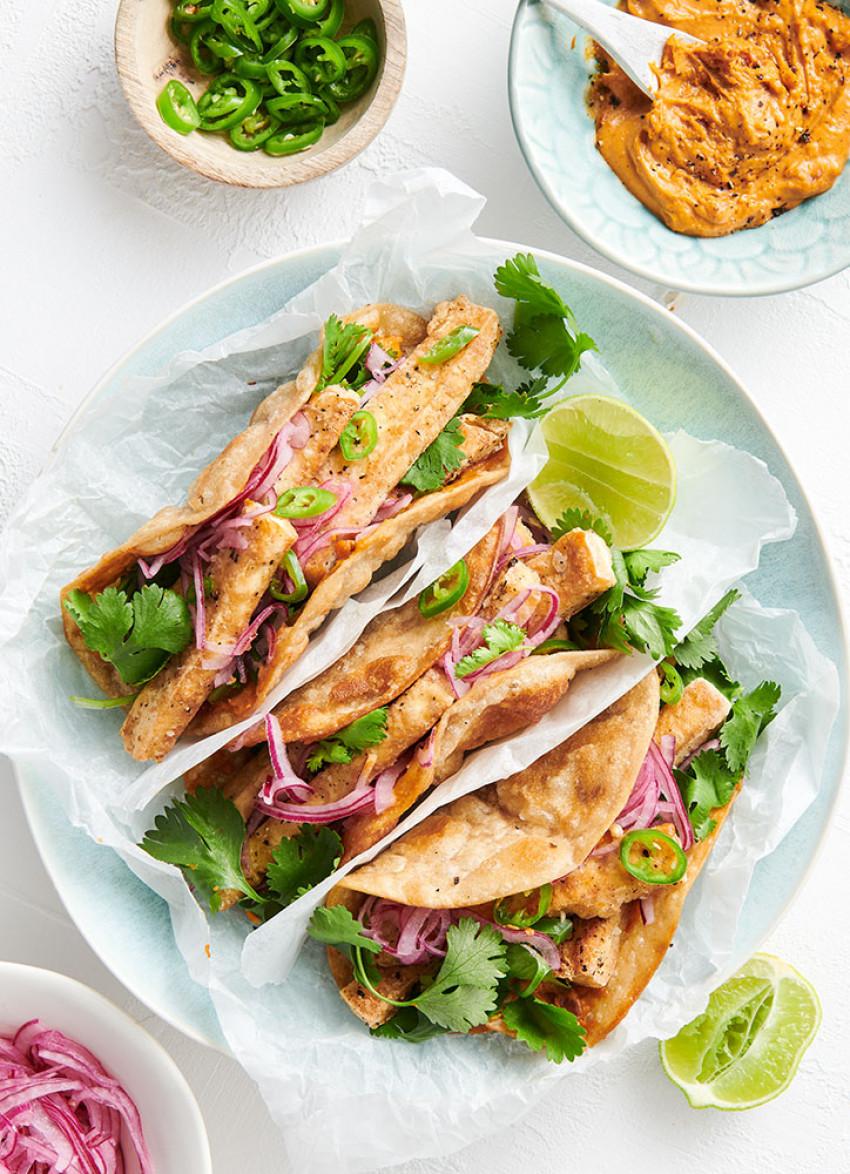 Spicy Tofu and Peanut Roti with vibrant colors and garnishes