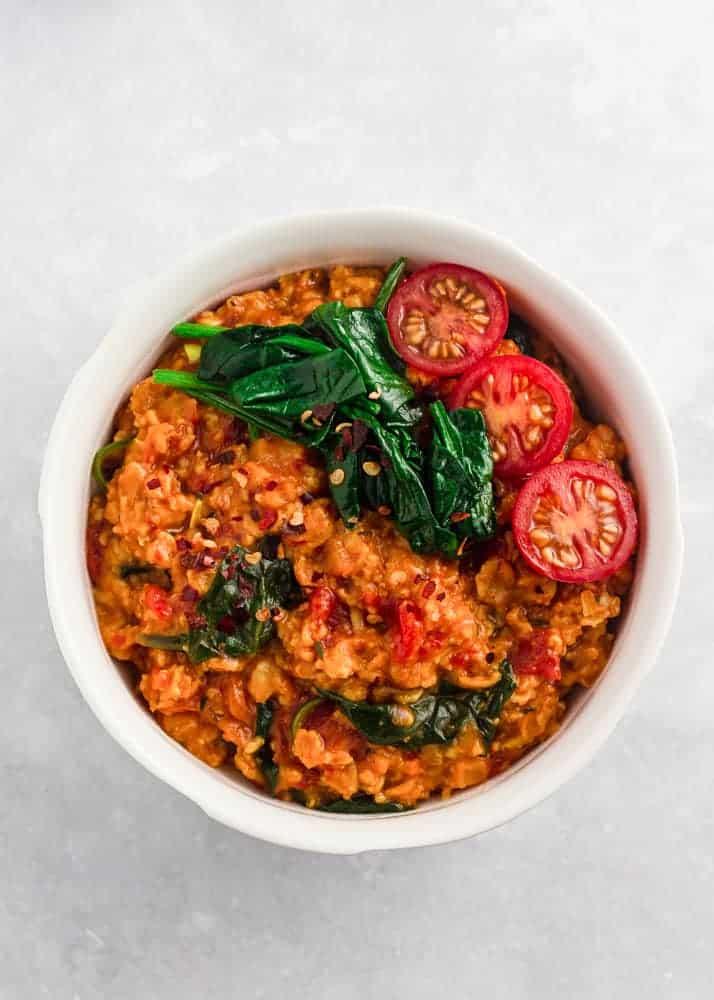 Close up of a bowl of Jollof rice with oats