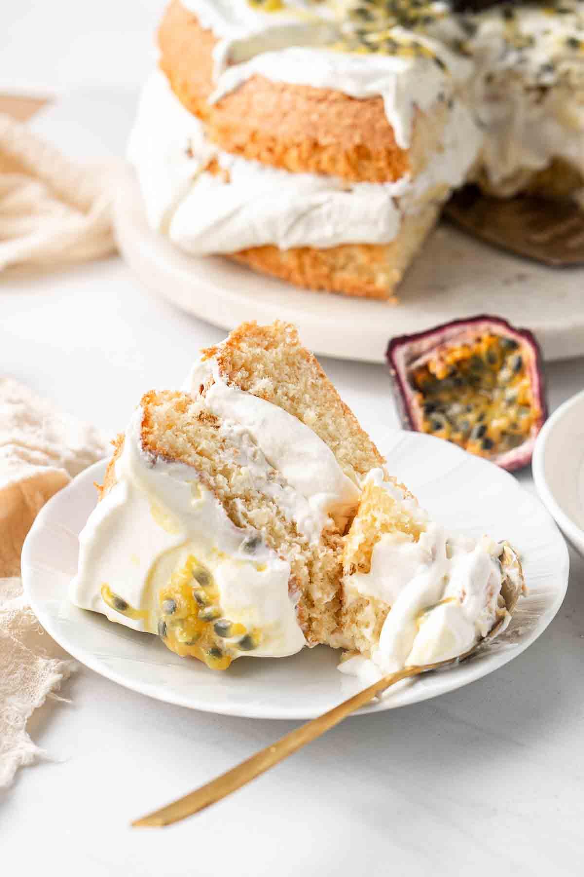 Close-up of a slice of Passion Fruit and Cream Cake showing the layers and texture