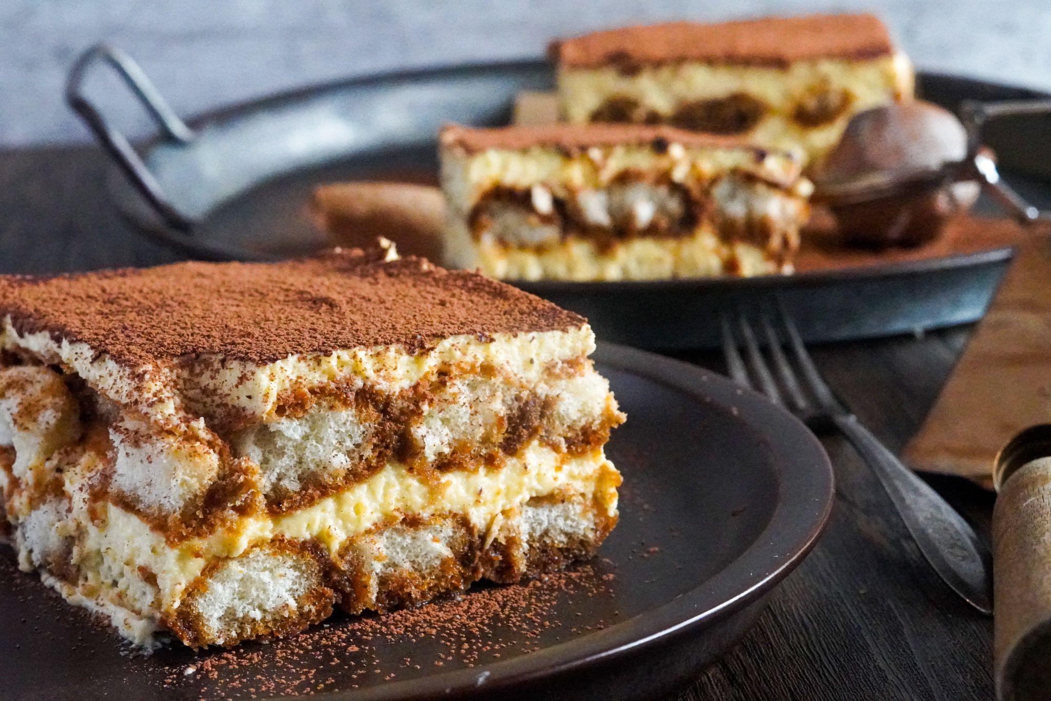 A classic Italian tiramisu dessert with layers of coffee-soaked ladyfingers and creamy mascarpone cheese