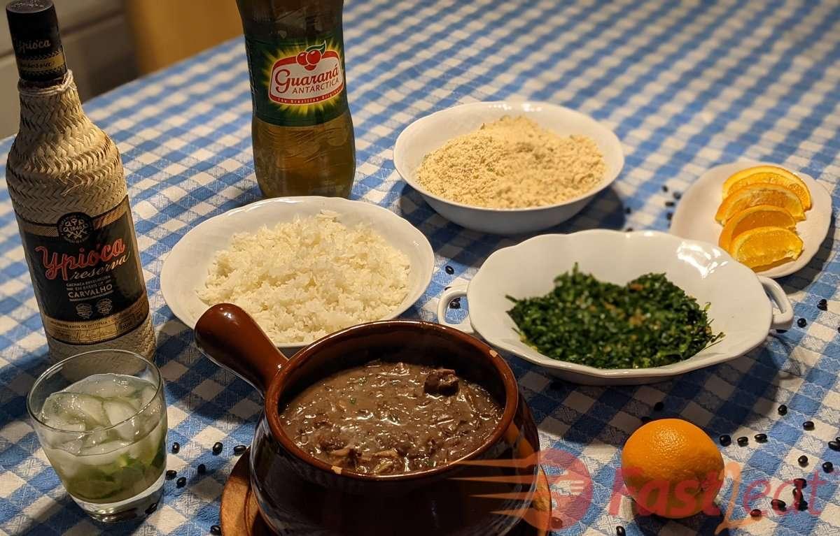 A person ladling feijoada into a bowl