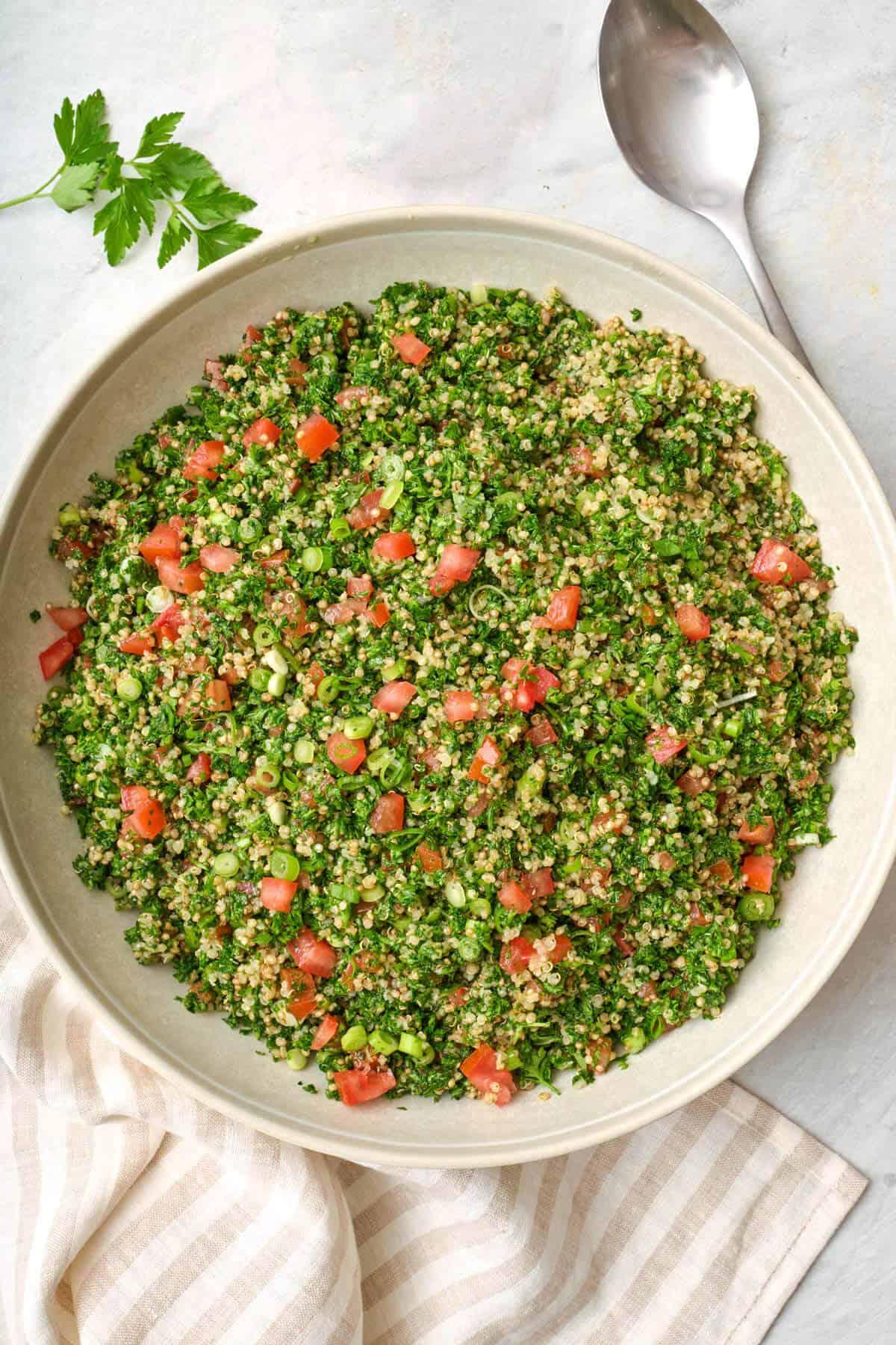 Close-up shot of the finished quinoa salad, highlighting the vibrant colors and textures