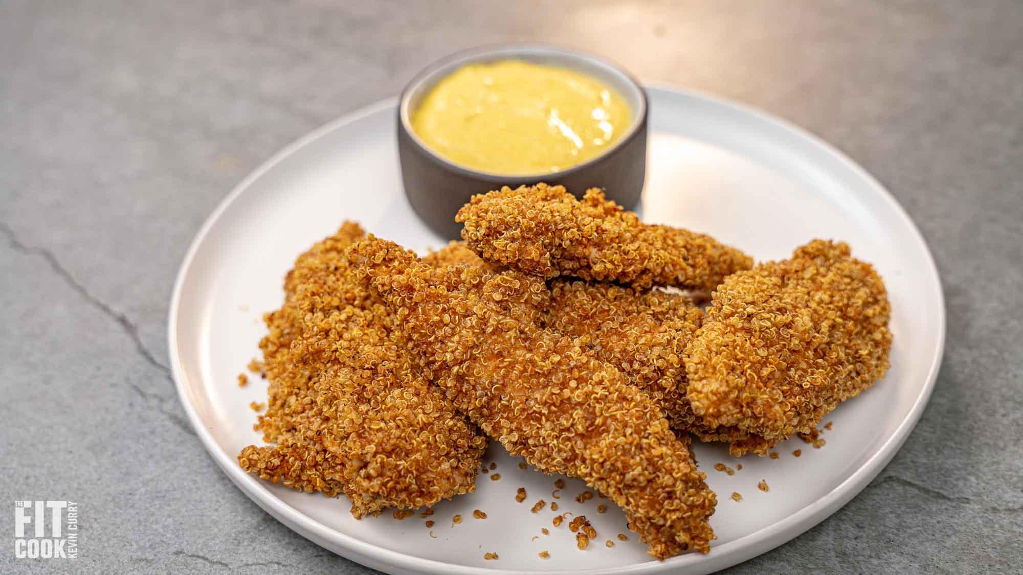 Crispy quinoa crusted fried chicken on a plate