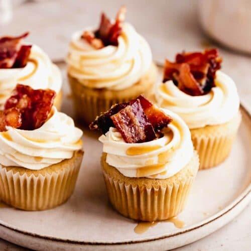 A tempting image of several maple bacon cupcakes, with a focus on textures