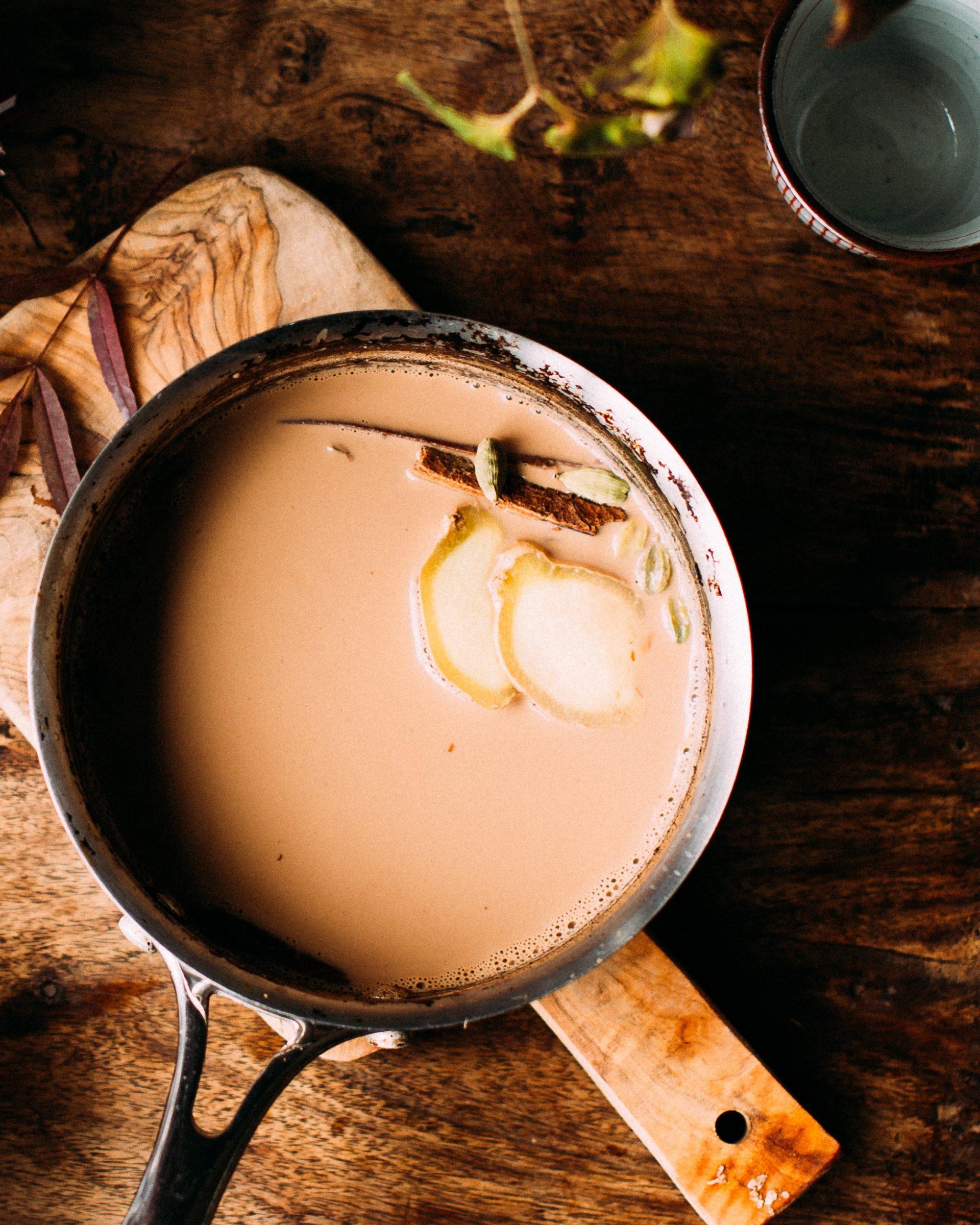 Close-up shot of chai tea brewing in a saucepan