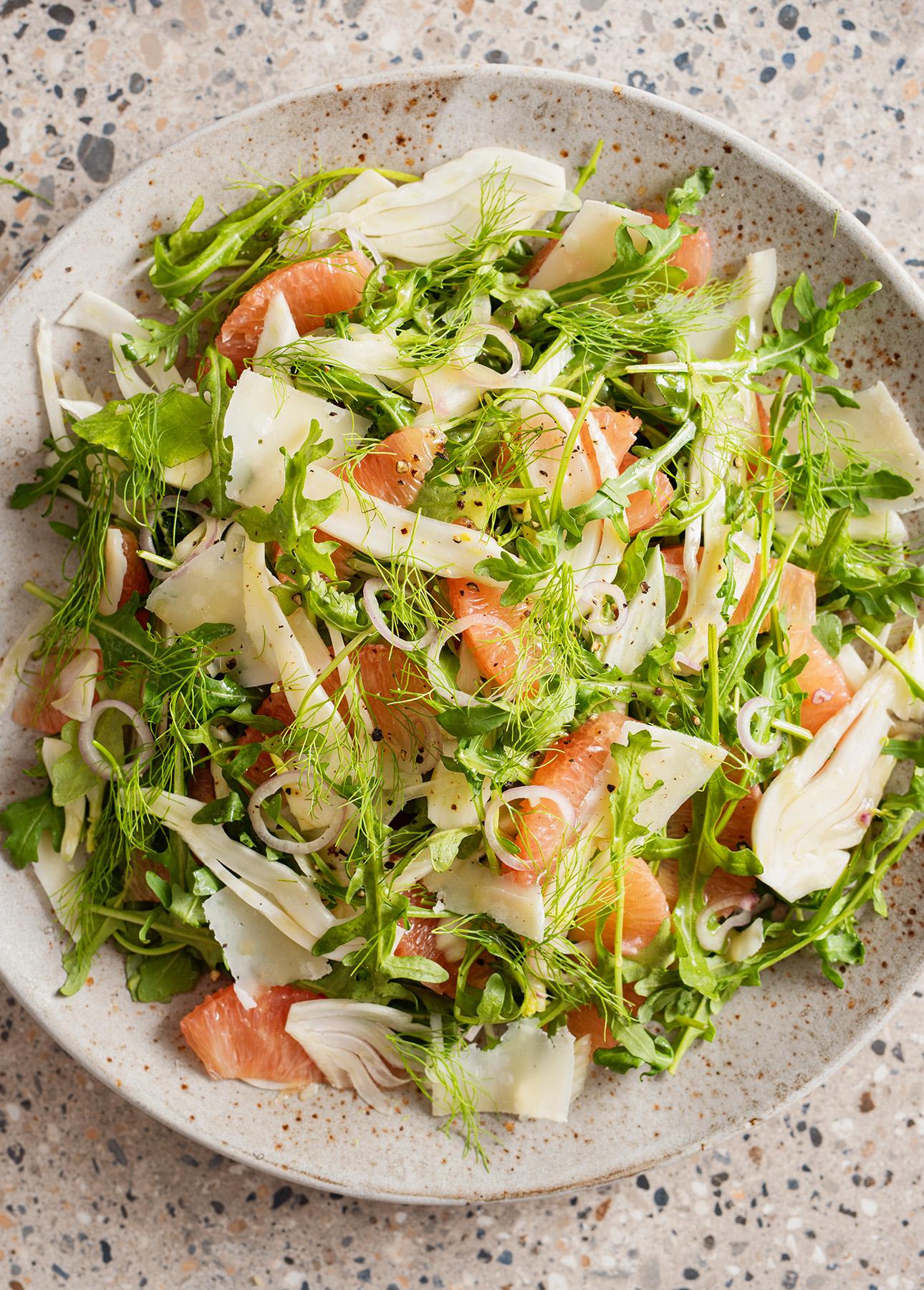 Close-up of a grapefruit and fennel salad showcasing vibrant colors and textures
