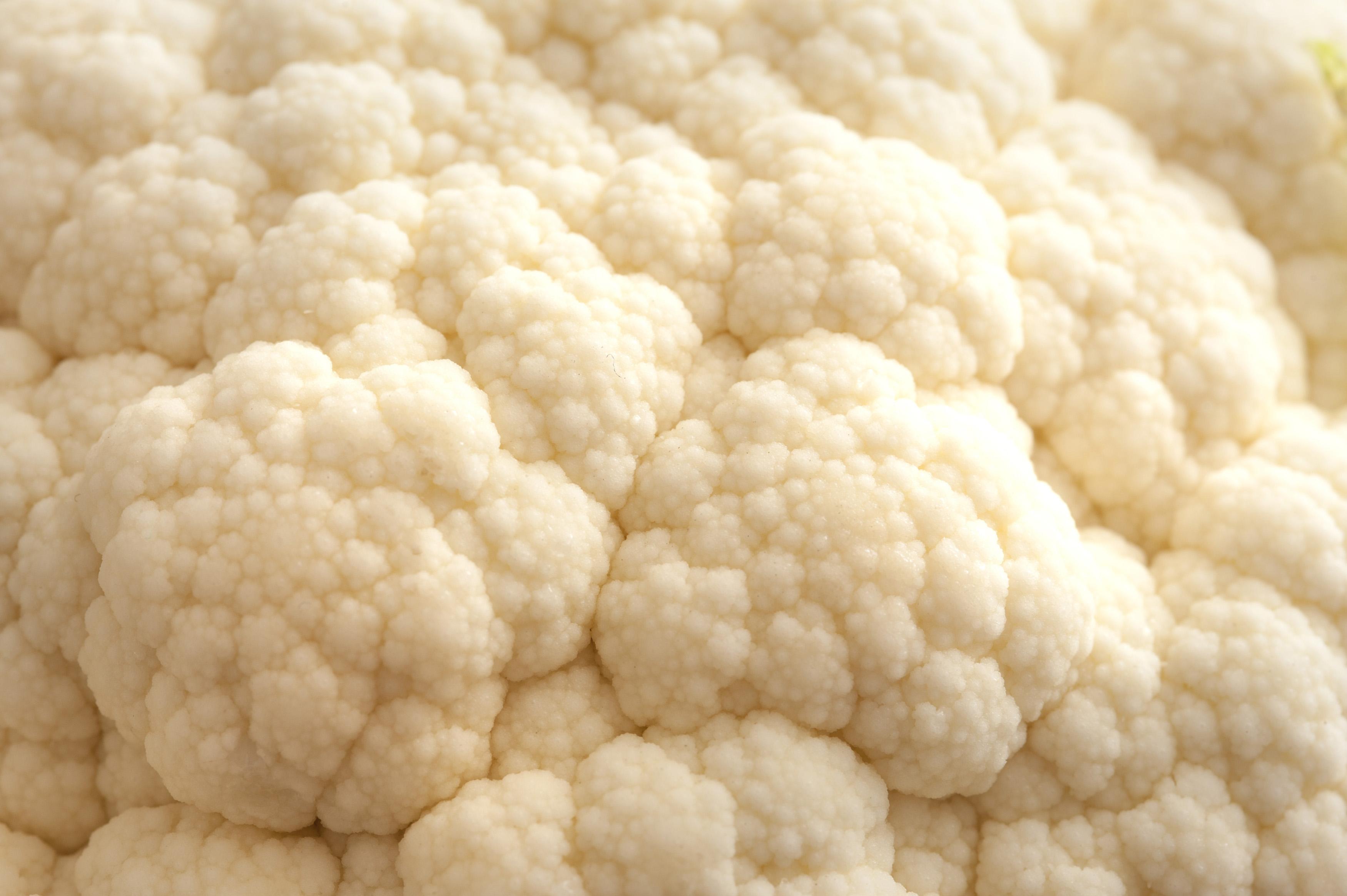 Close-up of cauliflower peels, showing their texture and color