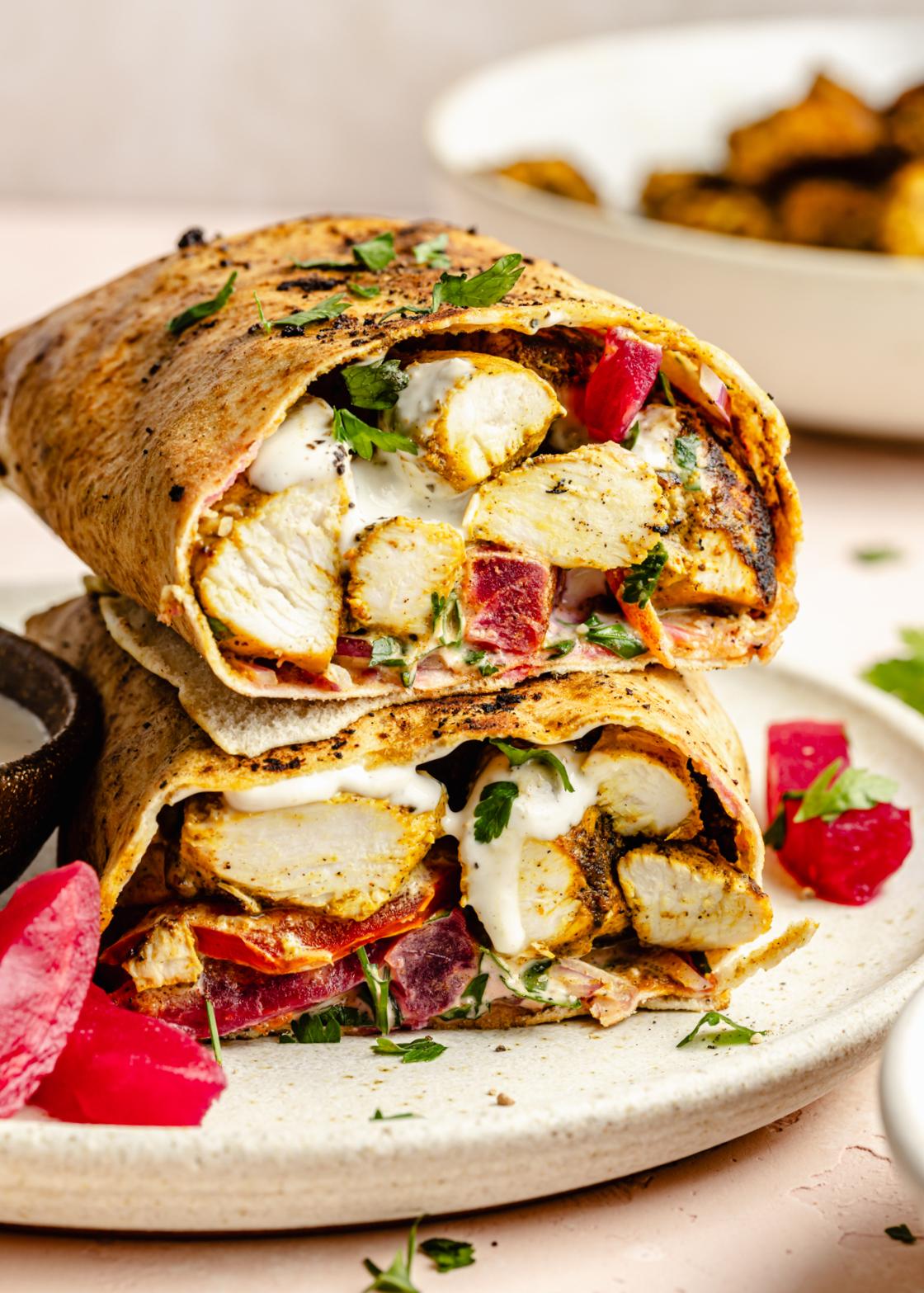 Delicious chicken shawarma wraps with creamy tahini sauce