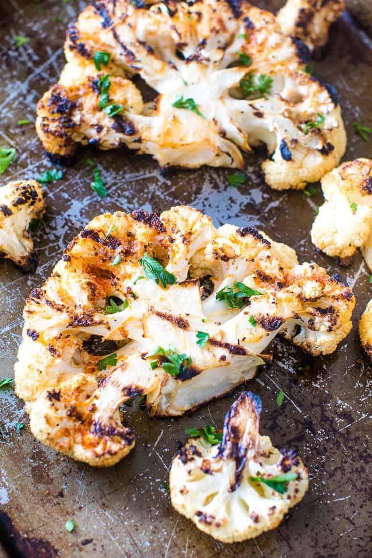 Close-up of a single cauliflower steak, showing the texture and sear.