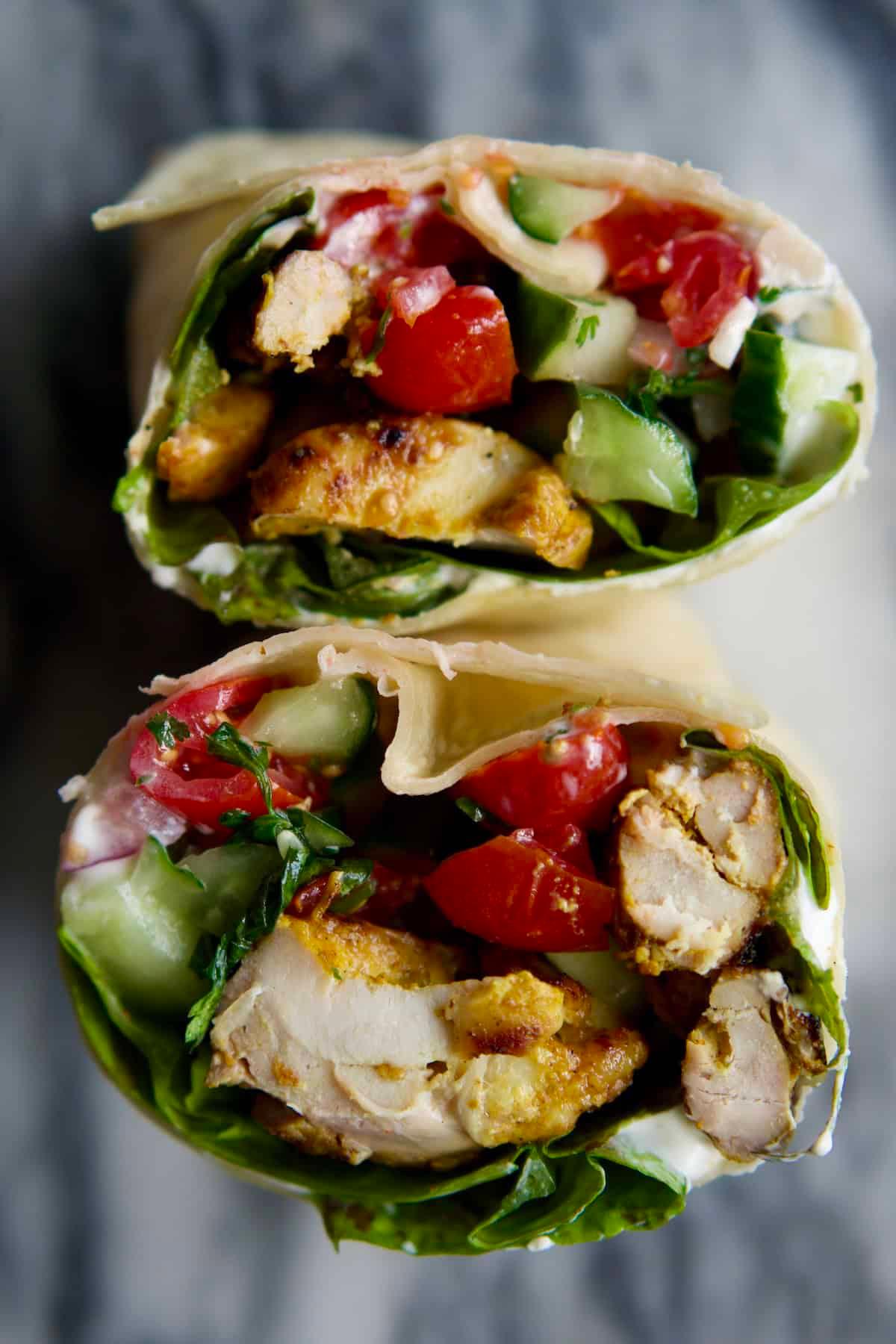 Chicken Tikka Masala Wraps with Raita garnished with fresh cilantro
