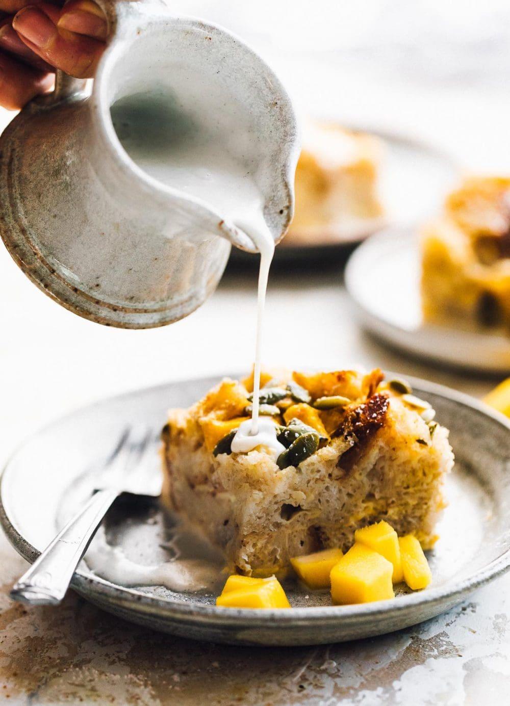 A rustic setting with a warm slice of bread pudding and a steaming cup of coffee