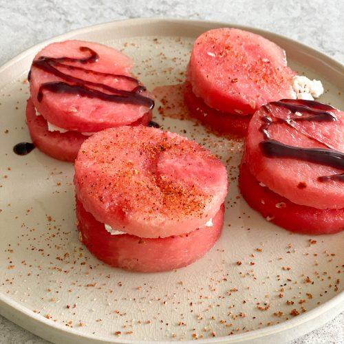various shapes of watermelon feta sandwiches cut with cookie cutters