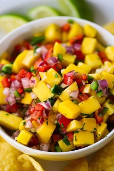 Close-up of the mango salsa with a lime wedge