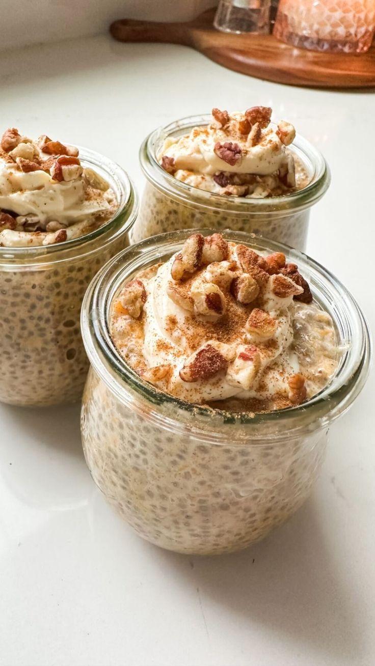 Sweet potato pie chia pudding in small jars, garnished with pecans