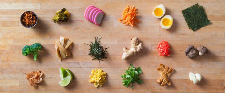 aerial view of a variety of ramen toppings, neatly arranged