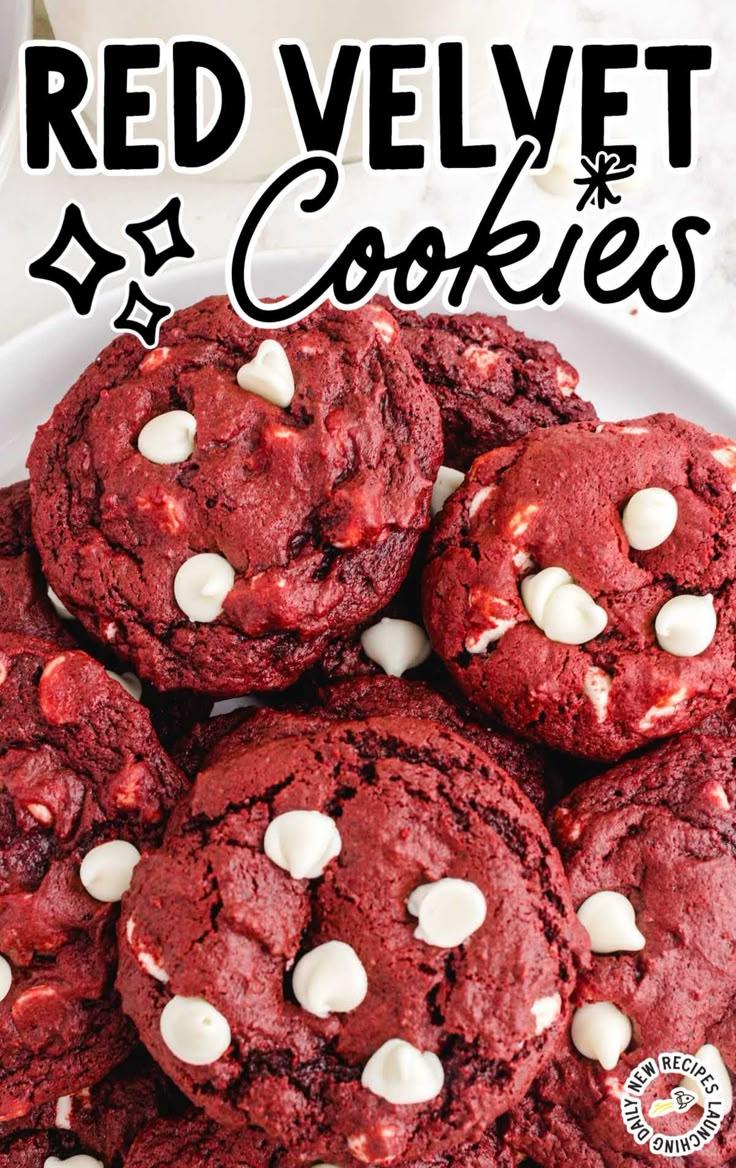 overhead shot of a baking sheet filled with red velvet sliders with white chocolate chips