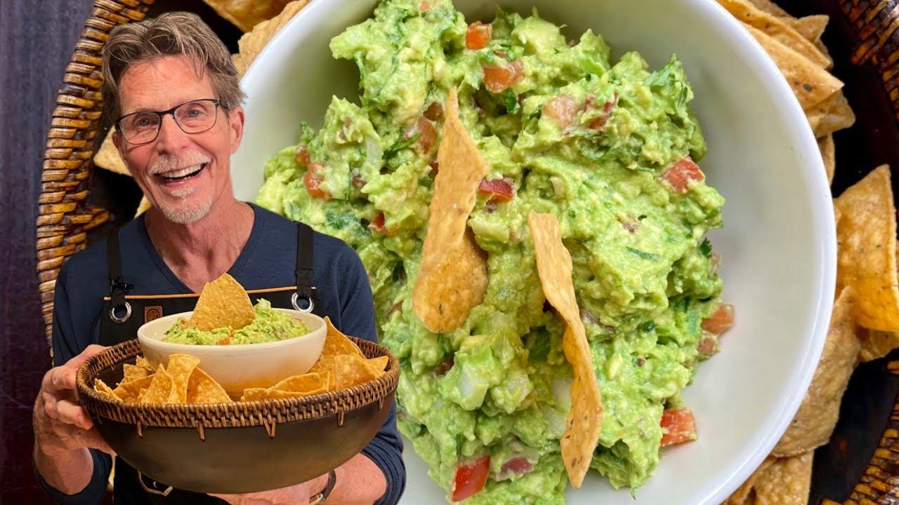A person happily enjoying a Mexican Shawarma, with a side of guacamole.