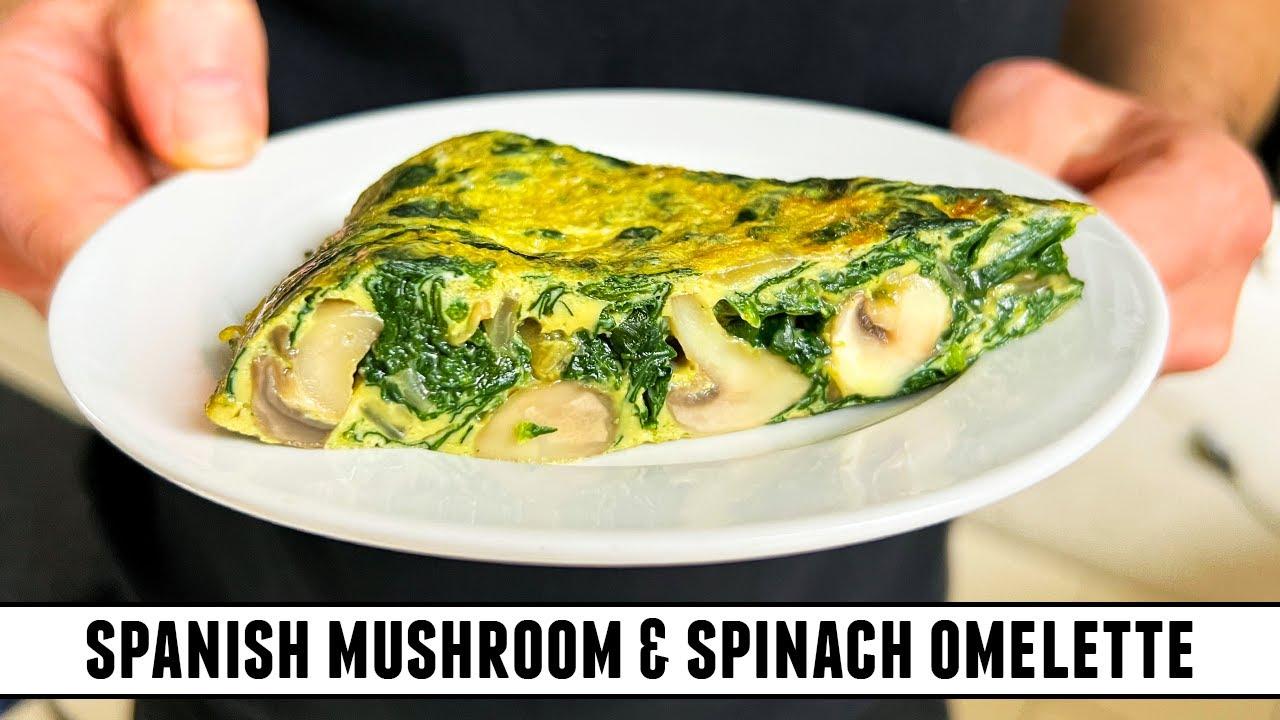 Close up of a delicious spinach and mushroom omelette, steam rising