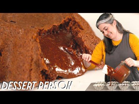 close up of a person taking a bite of molten chocolate lava cake