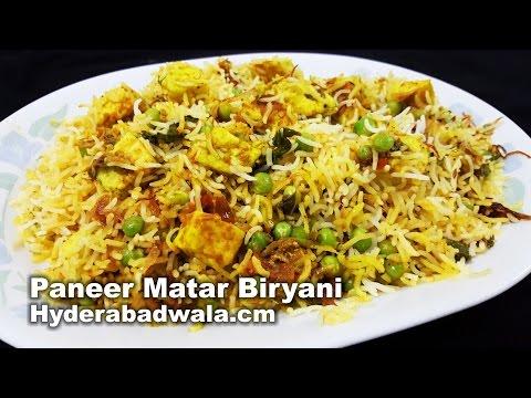 Close-up of Mutter Paneer Biryani with steam rising